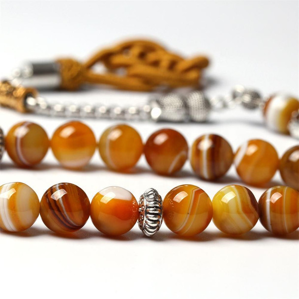 Natural agate stone prayer beads showing unique banded patterns