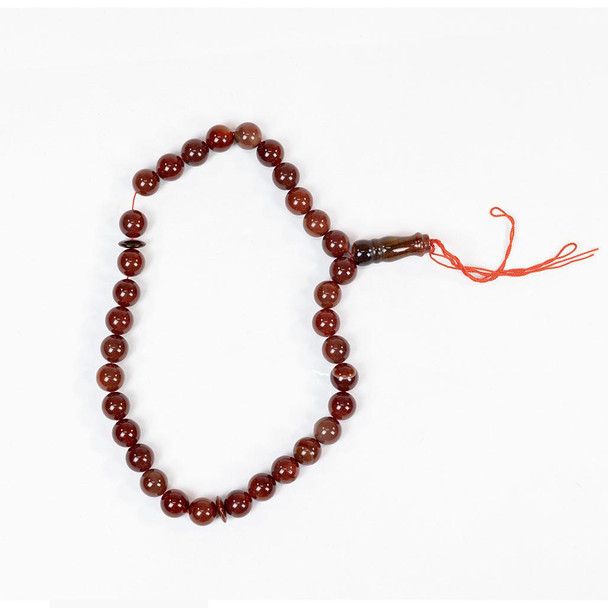 Red sibha prayer beads for dhikr and daily spiritual reflection