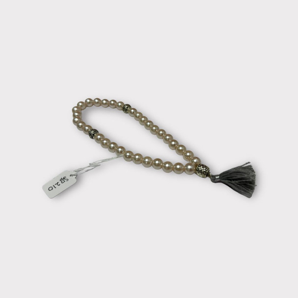 Muslim prayer beads tasbih with decorative silver  accents and tassel