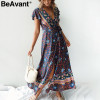 BeAvant Bohemian floral print summer dress 2019 V neck ruffle sleeve beach maxi dress Vintage sash women dress sexy vestidos