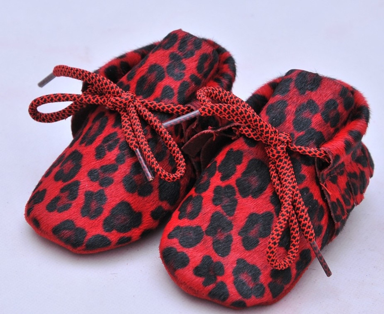 red leather baby shoes