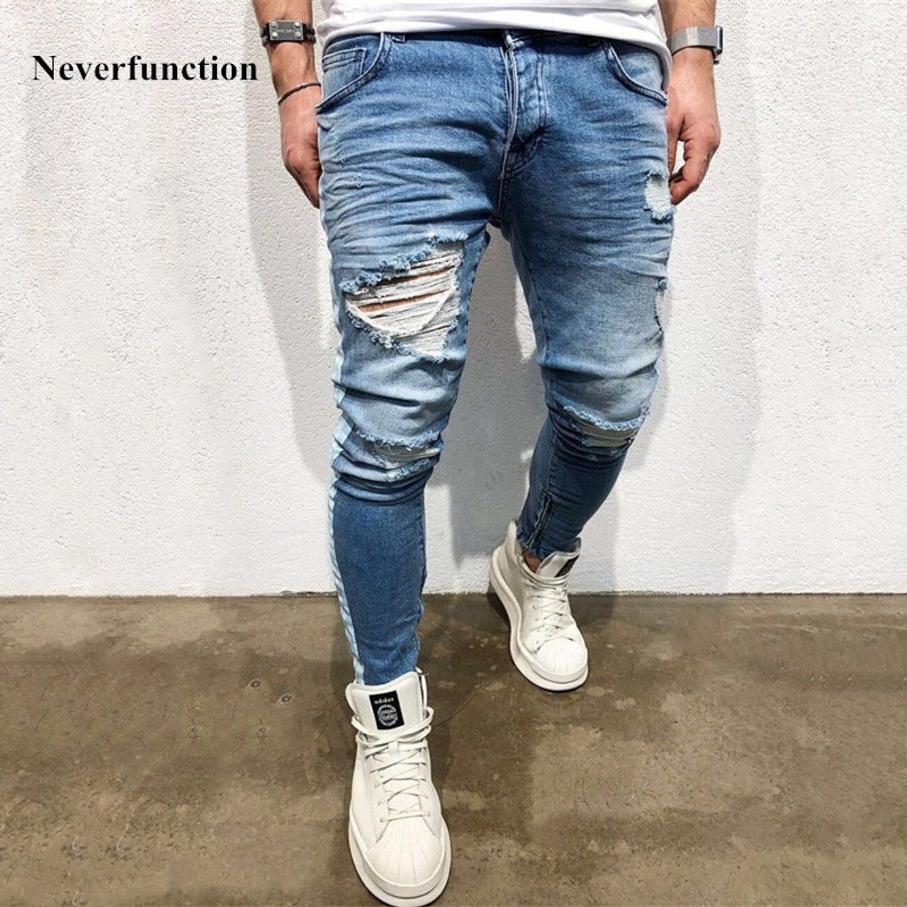 knee torn jeans mens