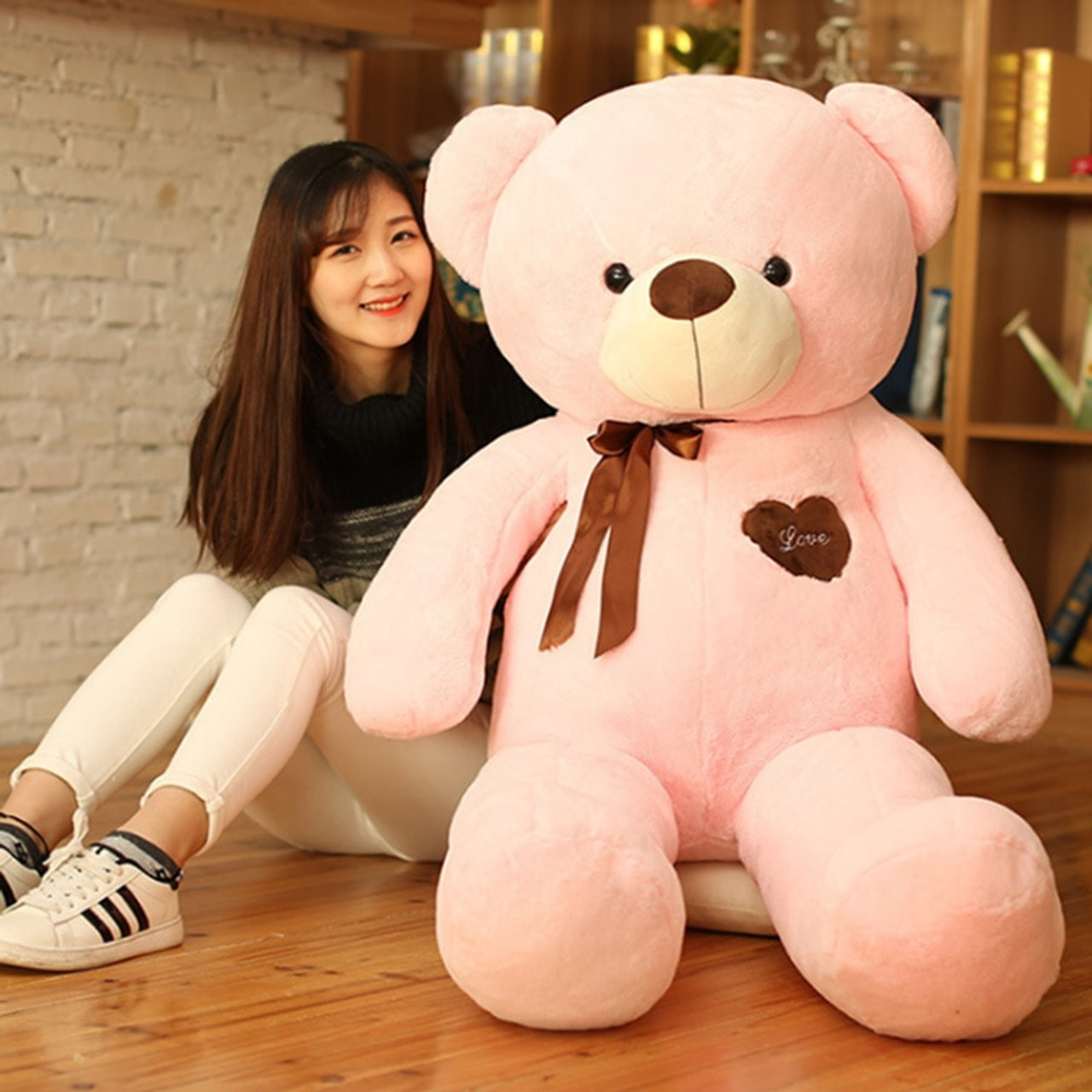 big teddy with girl