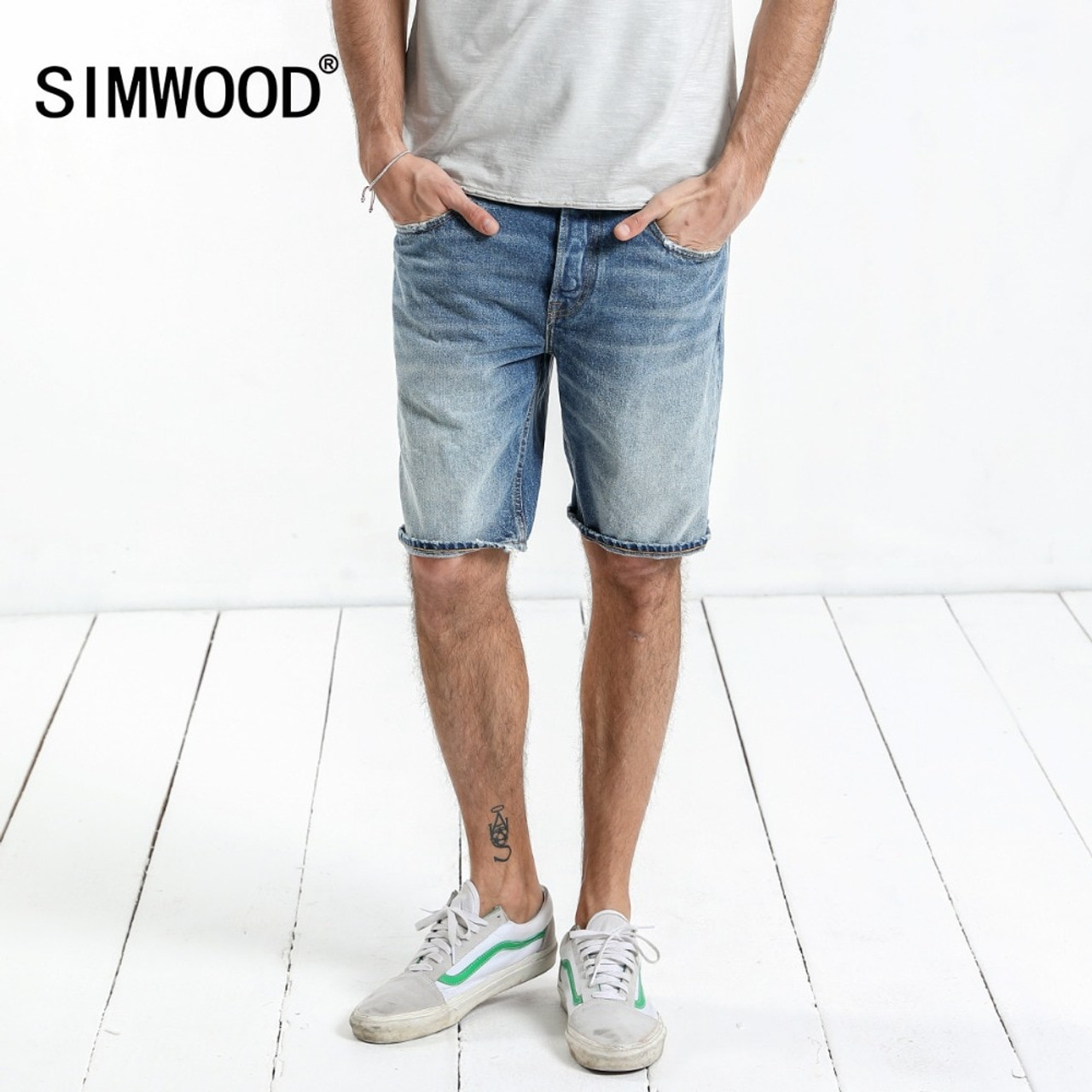 ripped knee length denim shorts