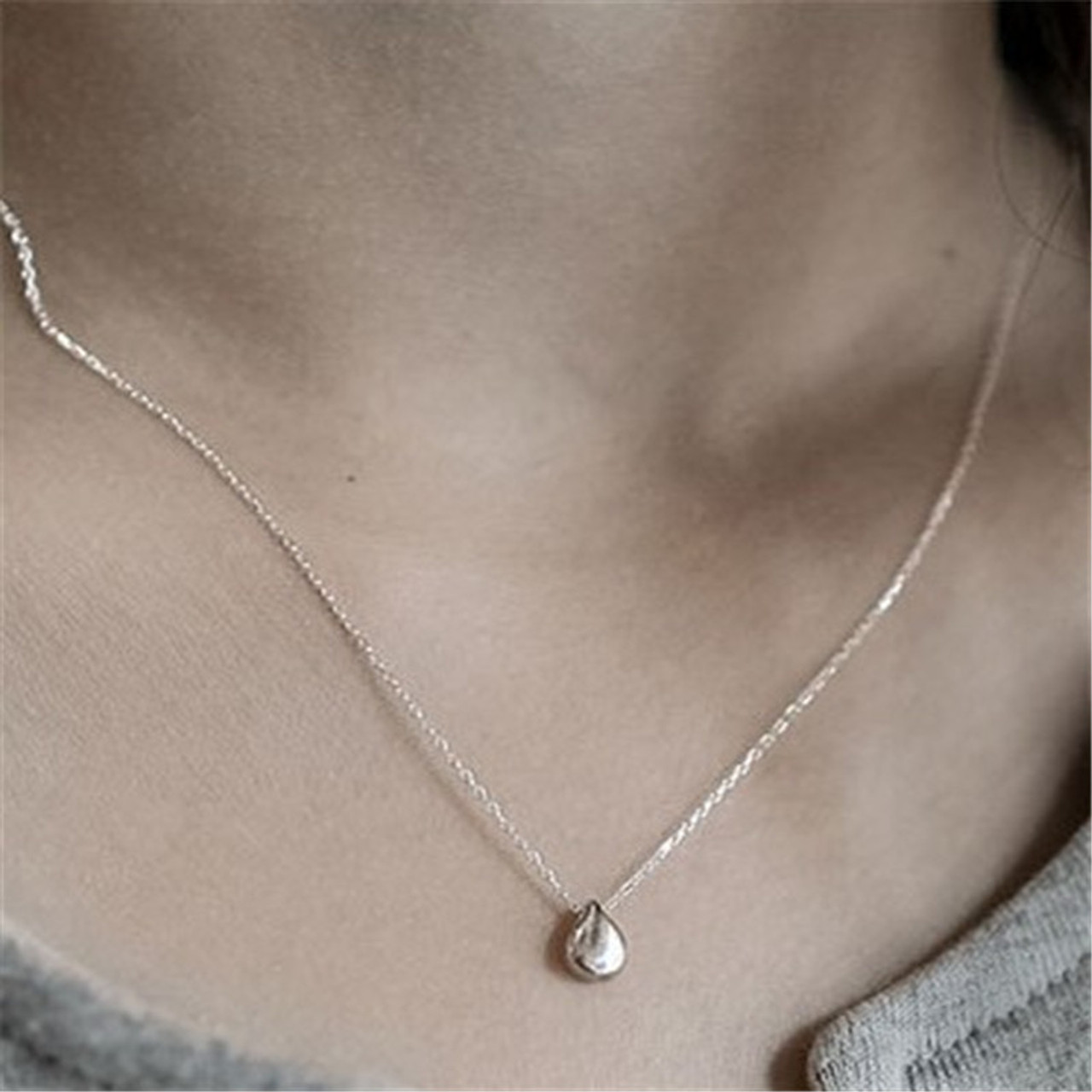 simple silver necklace with pendant