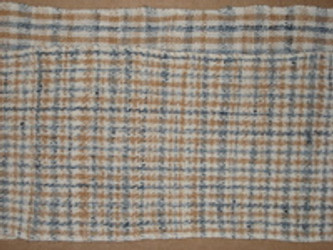 Shaping cloth with twist energy and weave structure