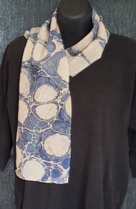 Silk scarf marbled with indigo and dyed with brazilwood
