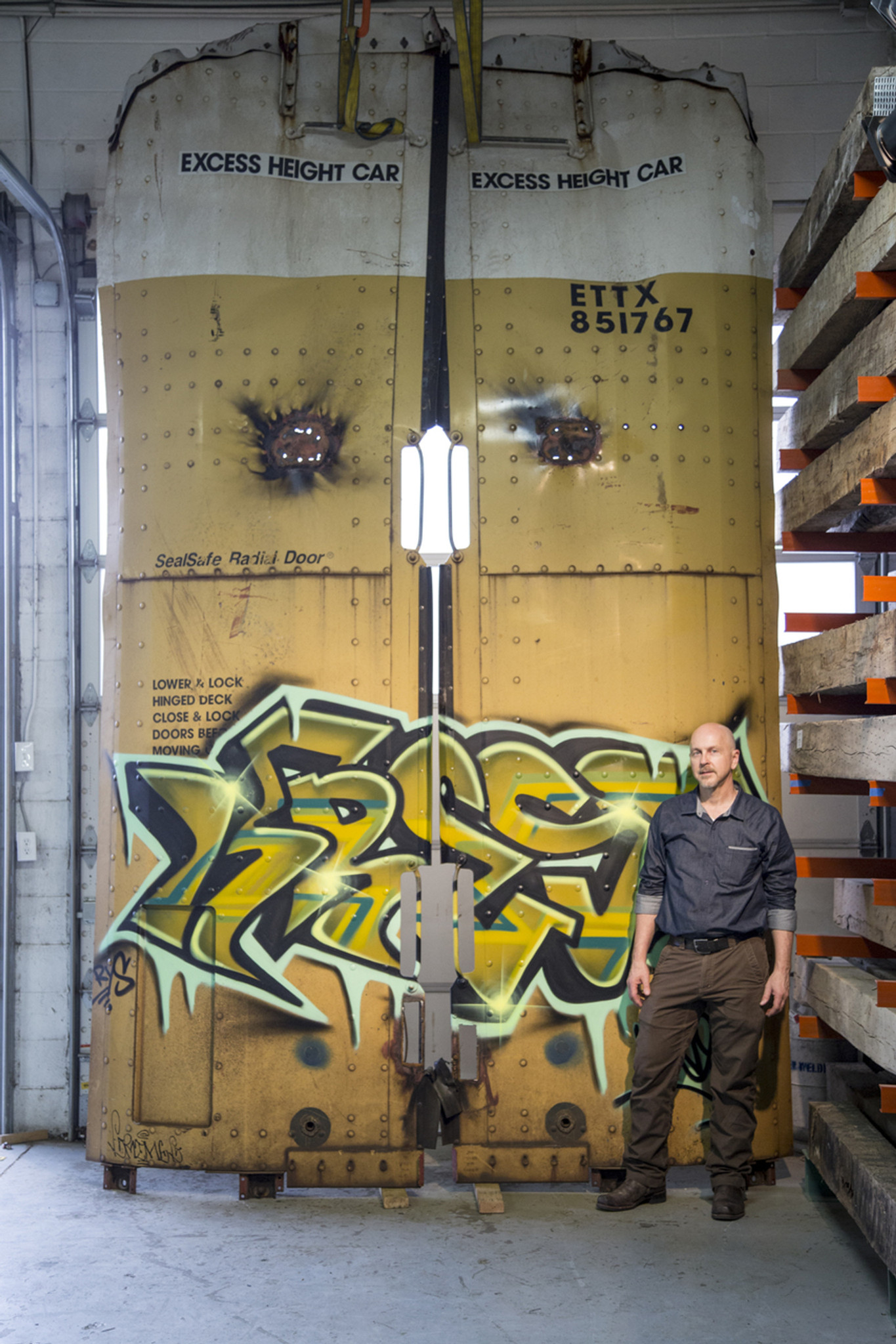 Big original graffiti spray paint on authentic steel railcar doors