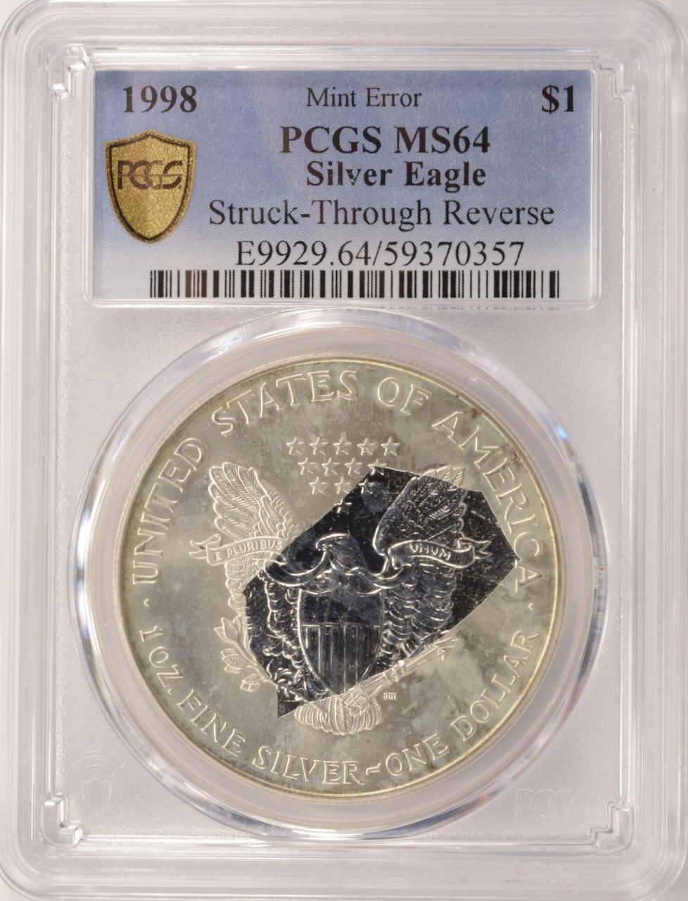 1998 $1 Silver Eagle Struck Through Reverse PCGS MS64