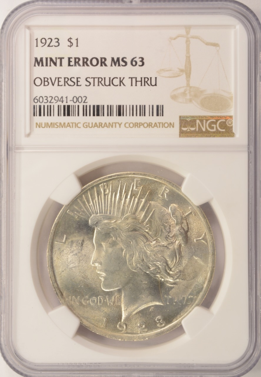 1923 $1 Peace Dollar Obverse Struck Thru NGC MS63