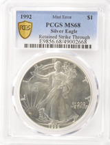 1992 $1 Silver Eagle Retained Struck Through Obverse 8:00 PCGS MS68