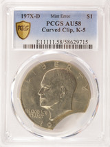 197X-D $1 Ike Dollar 7% Curved Clip at K-5 AU58