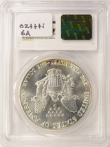 PCGS 1986 $1 Silver Eagle Struck Thru Emory Sanding Disc PCGS MS64