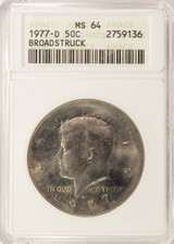 1977-D 50c Kennedy Half Huge Broadstrike ANACS MS64