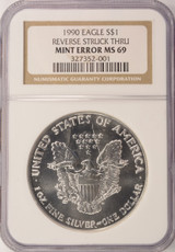 1990 $1 Silver Eagle Struck Thru Reverse NGC MS69