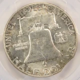 1958 50c Franklin Half 2% Curved Clip at 1:00 PCGS MS64