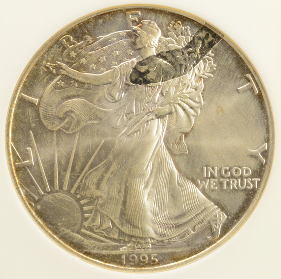 1995 $1 Silver Eagle Struck Thru Plastic ANACS MS66