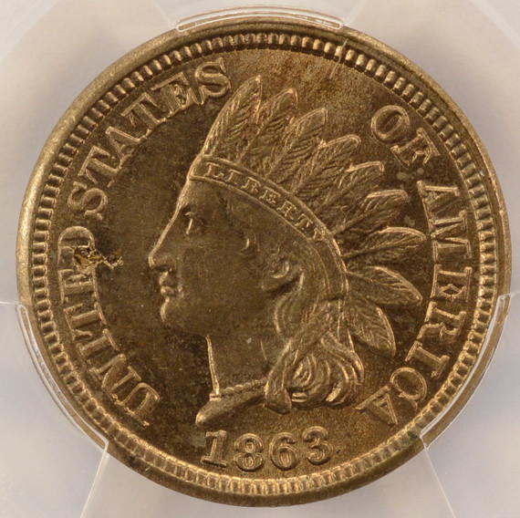 PCGS 1863 Indian cent with a piece of rolled in, retained wood obverse. The wood can be clearly seen with a loupe, and is stuck in the metal of the coin, with a rough, defective area in the metal where the piece of wood was rolled into the planchet's metal. 



Finding the wood retained in the coin is rare, and this is the only example of this we can recall having seen!