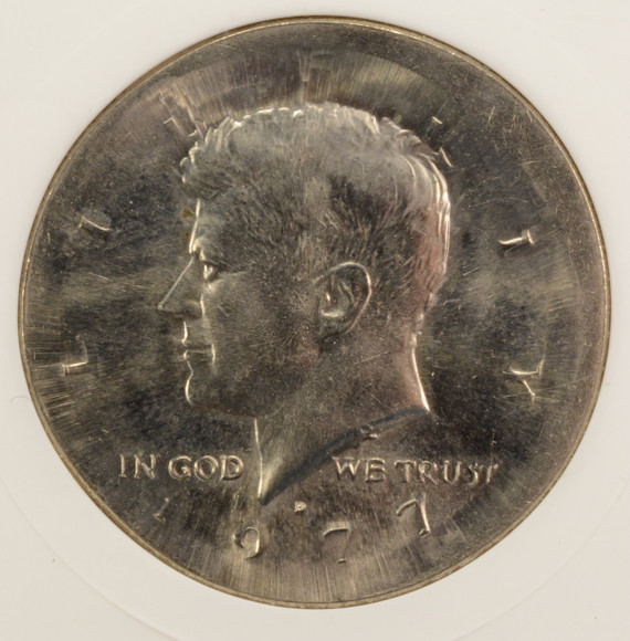 1977-D 50c Kennedy Half Huge Broadstrike ANACS MS64