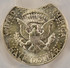 1964 50c Kennedy Half 8% Curved Clip PCGS MS65