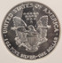 1990 $1 Silver Eagle Struck Thru Reverse NGC MS69