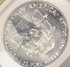 1990 $1 Silver Eagle Struck Thru Reverse NGC MS69