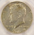 1964 50c Kennedy Half Struck Thru Reverse PCGS AU55