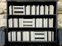 White and natural parchment bound spines with a touch of modern hardbound books in black - (By the Foot)