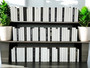 100 Vol. White parchment bound spines with a touch of modern hardbound books in black