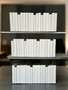 50 Vol. White parchment bound spines.