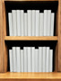 24 Vol. White parchment bound spines.