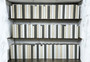 100 Vol. White, natural and gray parchment bound spines.