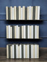 50 Vol. White, natural and gray parchment bound spines.