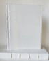 "Antiqued" White Parchment with Raised Bands / White Cover / 10-11" (By the Book)