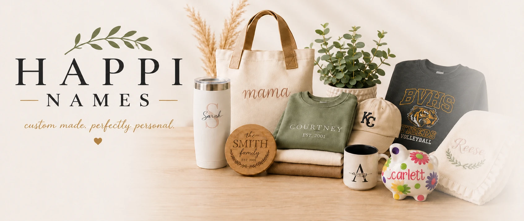 Happi Names -- custom made, perfectly personal. A personalized tumbler, tote bag, engraved family sign, embroidered sweatshirts, cap, mug, piggy bank and baby blanket.