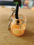 Orange drink stitch marker, miniature, resin