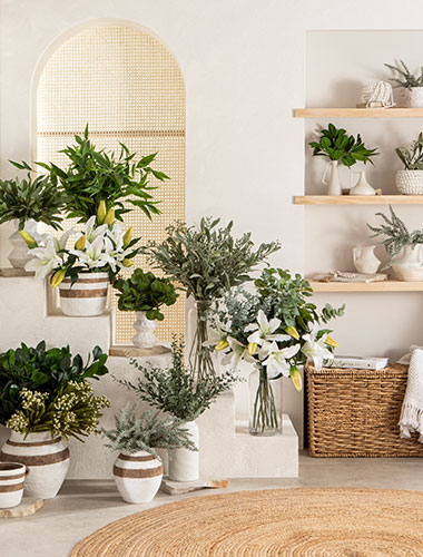 Pillow Talk Artificial Flowers Buying Guide Large bunches of artificial flowers against a wall