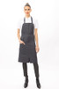 Curved hem and front slit detail of lightweight twill bib apron