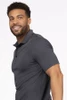 Men’s hospitality polo showing snug form fit through the chest and body