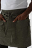 Close-up of Utility Half Bistro Apron pockets with pencil divide and dual-entry storage