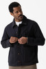 Close-up of metal button front closure on 25/7 Utility Chore Coat in cotton canvas