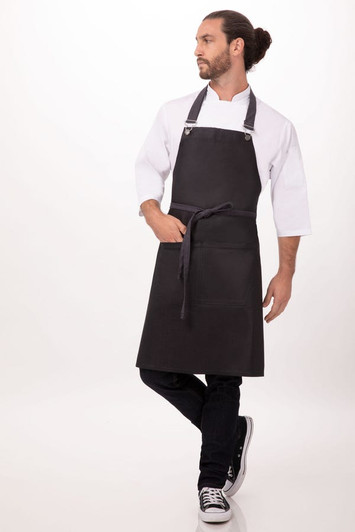 Front view of Boulder Bib Apron in purple/black with waxed finish