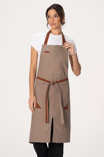 Front view of Fileas Bib Apron in taupe with contrasting brown neck strap