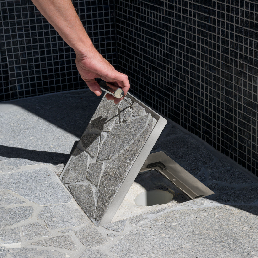 HIDE drain cover installed in tiled patio