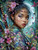 Fantasy woman with floral hair and sword standing in bamboo forest with full moon behind her