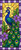 Elegant stained glass peacock with flowing green and blue tail feathers surrounded by purple flowers and glowing golden background.