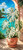 Large cream and green variegated Monstera in a coral planter overlooking turquoise tropical water and palm trees.