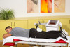 emFieldPro large static applicator positioned over the upper thigh and gluteal region for contact-free High Energy Inductive Therapy through clothing