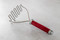 KitchenAid Stainless Steel Potato Masher - Red - DISCONTINUED ITEM - PLEASE CLICK BELOW FOR THE NEW IMPROVED VERSION