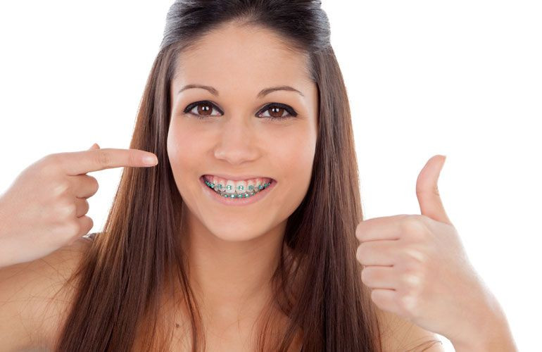 Premium Photo  Alignment of crooked teeth with the help of braces